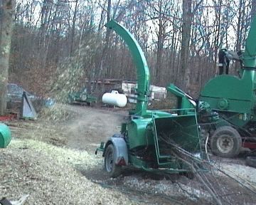 Autonomous SUPER-PAIN 600 chipper with bough-dragger on road trailer